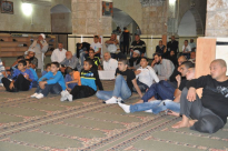 بالصور: حفل توزيع جوائز الفائزين في مسابقة رمضان العلمية في المسجد العمري بالرملة